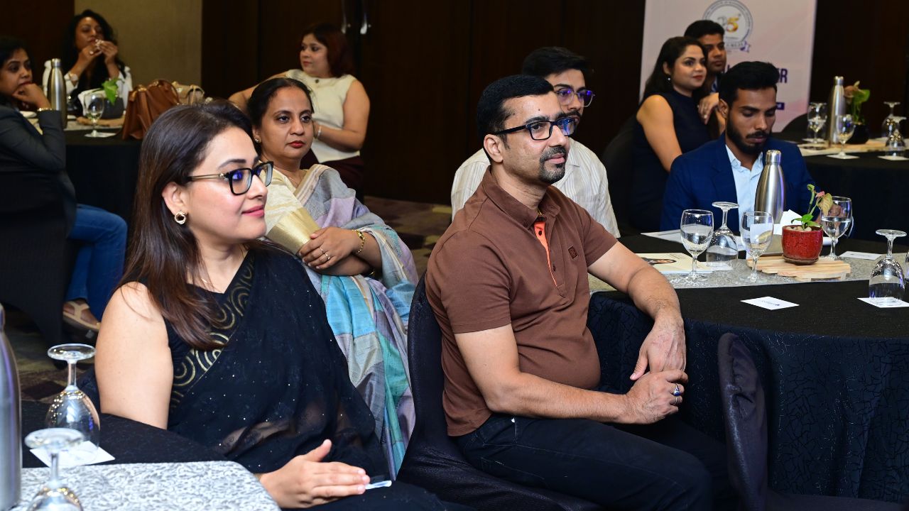 Audience listening to the welcome address at the Bengaluru alumni dinner